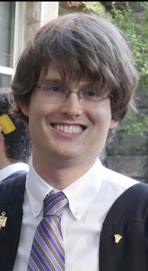 T. A. Morris smiling at an academic Convocation